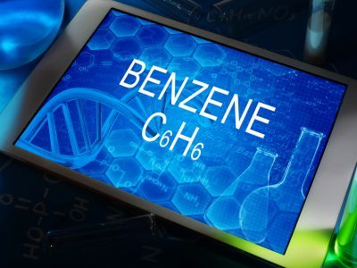 The chemical formula of Benzene on a tablet with test tubes
